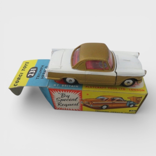 35 - Corgi  No. 231 Triumph Herald Coupe, excellent in good plus box, two-tone white and gold, red interi... 