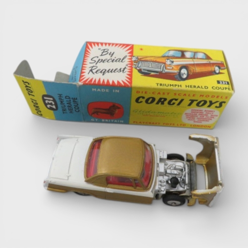 35 - Corgi  No. 231 Triumph Herald Coupe, excellent in good plus box, two-tone white and gold, red interi... 