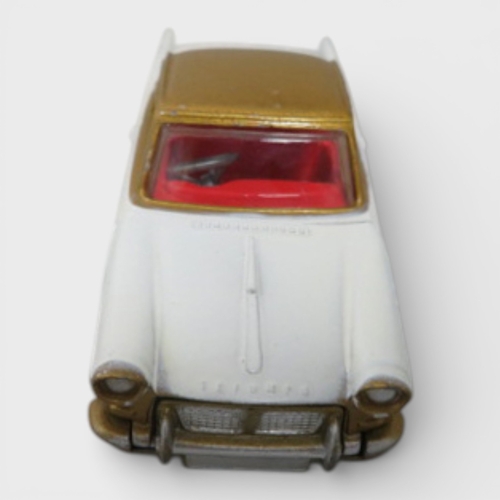 35 - Corgi  No. 231 Triumph Herald Coupe, excellent in good plus box, two-tone white and gold, red interi... 