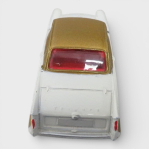 35 - Corgi  No. 231 Triumph Herald Coupe, excellent in good plus box, two-tone white and gold, red interi... 
