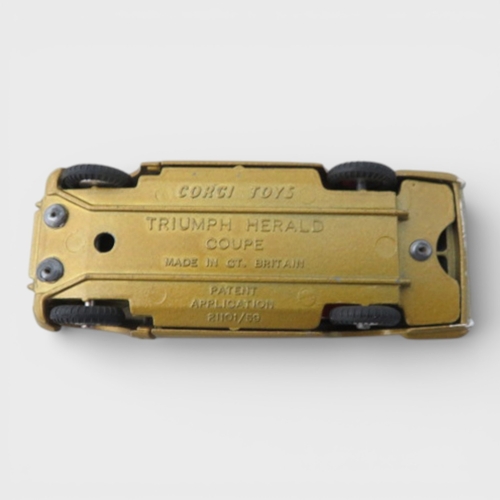 35 - Corgi  No. 231 Triumph Herald Coupe, excellent in good plus box, two-tone white and gold, red interi... 
