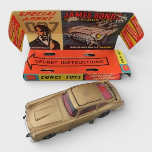 41 - Corgi No. 261 James Bond 007 Aston Martin DB5 (Goldfinger film), gold with Bond and Bandit figures, ... 