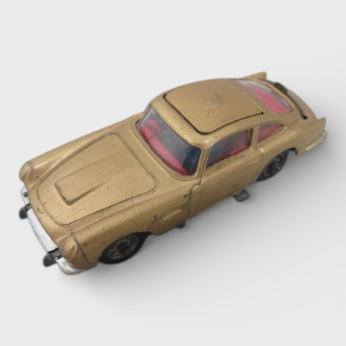 41 - Corgi No. 261 James Bond 007 Aston Martin DB5 (Goldfinger film), gold with Bond and Bandit figures, ... 