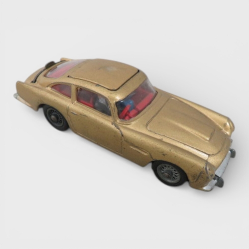 41 - Corgi No. 261 James Bond 007 Aston Martin DB5 (Goldfinger film), gold with Bond and Bandit figures, ... 