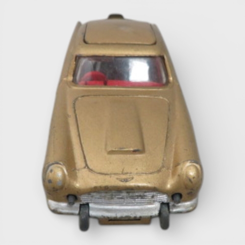 41 - Corgi No. 261 James Bond 007 Aston Martin DB5 (Goldfinger film), gold with Bond and Bandit figures, ... 