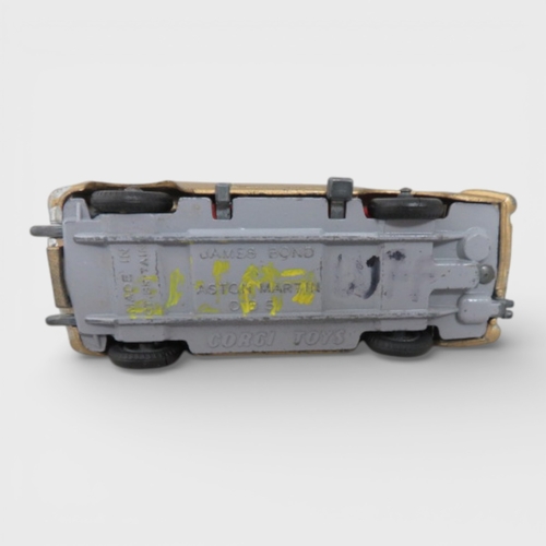41 - Corgi No. 261 James Bond 007 Aston Martin DB5 (Goldfinger film), gold with Bond and Bandit figures, ... 