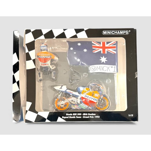 66 - Minichamps 1/12th scale Honda NSR500 Repsol 1995 M Doohan  with rider and flag No. 122 951001, gener... 
