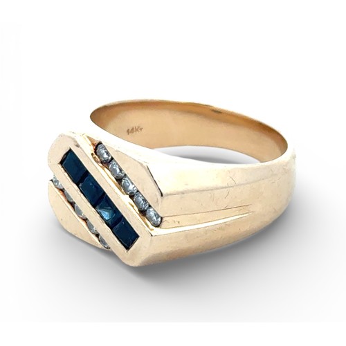 24 - A sapphire and diamond set signet ring stamped 14k. Size T