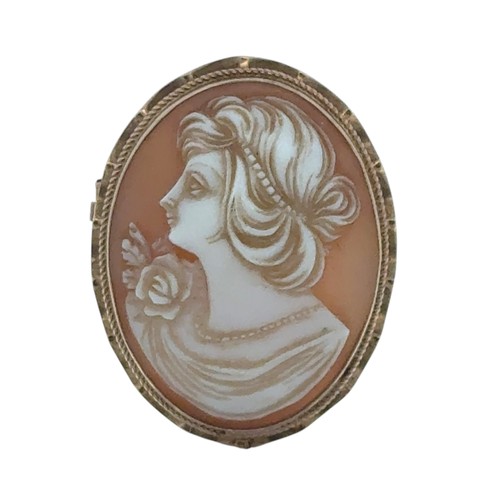 81 - A 9ct gold cameo brooch depicting a lady in profile, length 35mm. 8.11g