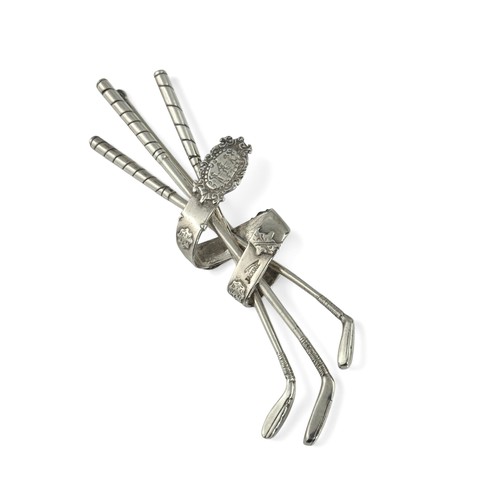 88 - A silver brooch modelled as three golf clubs held together by the Open Champion Belt, purported to h... 