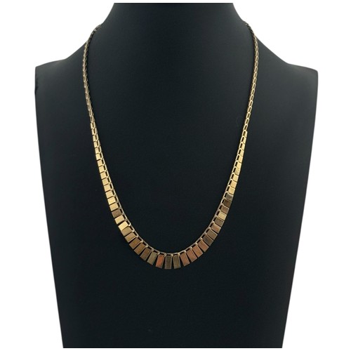 72 - A gold fringe necklace, stamped 375. 41cm long. 4.73g