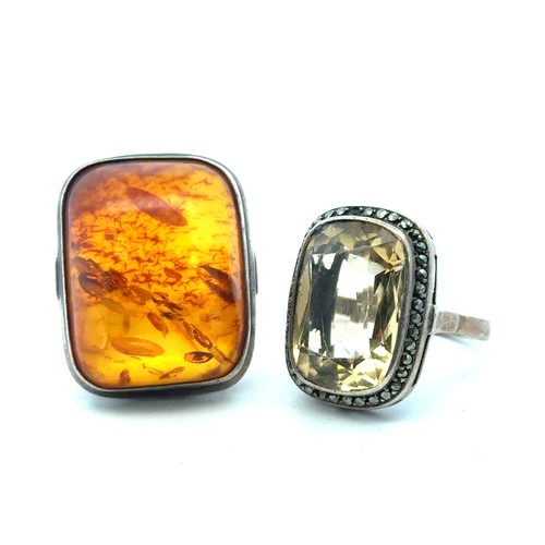 106 - Four jewellery items to include two rings and two necklaces:  a silver and quartz ring and a silver ... 