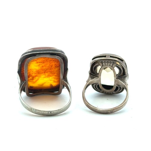 106 - Four jewellery items to include two rings and two necklaces:  a silver and quartz ring and a silver ... 