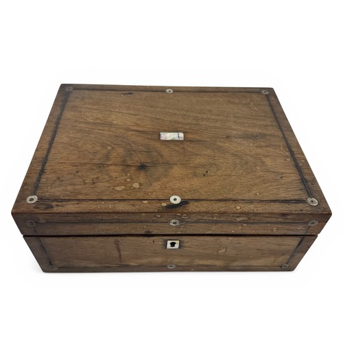 118 - A wooden sewing box containing jewellery, to include some single 9ct gold earrings, a Platinin marca... 