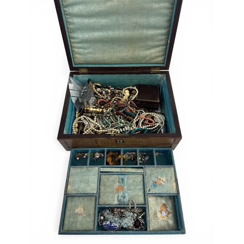 118 - A wooden sewing box containing jewellery, to include some single 9ct gold earrings, a Platinin marca... 