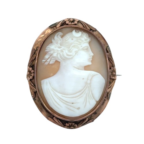 80 - A yellow metal cameo brooch, depicting the goddess Diana. Length 57mm, steel pin. 17.62g