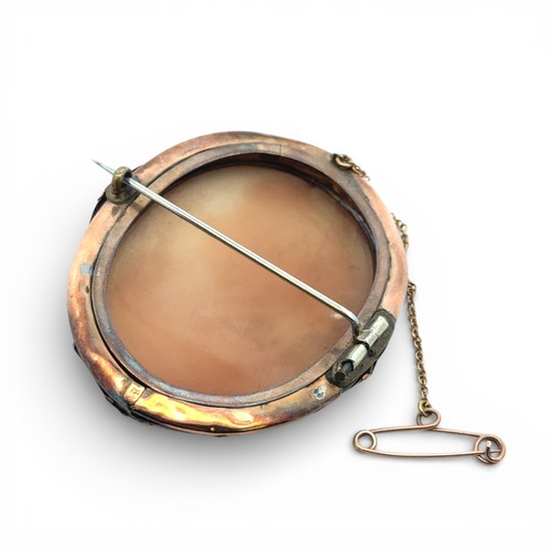 80 - A yellow metal cameo brooch, depicting the goddess Diana. Length 57mm, steel pin. 17.62g