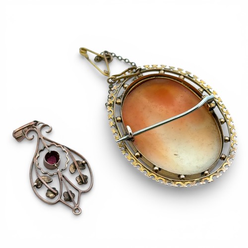 91 - A cameo brooch/pendant in fancy openwork yellow metal mount, length 44mm,  tests as approx 8ct gold,... 