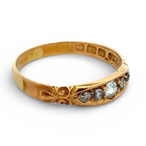 69 - An 18ct gold and old cut diamond boat ring with scroll shoulders. Size U. 3.07g