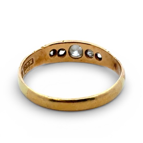 69 - An 18ct gold and old cut diamond boat ring with scroll shoulders. Size U. 3.07g