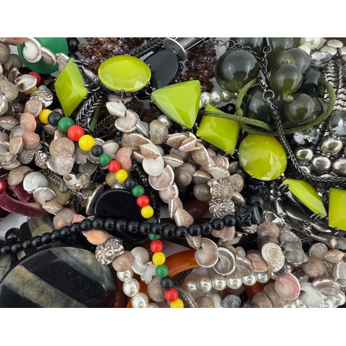 117 - A large quantity of jewellery, to include numerous bead necklaces, costume jewellery, a Victorian je... 