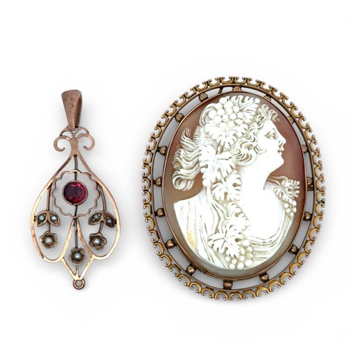91 - A cameo brooch/pendant in fancy openwork yellow metal mount, length 44mm,  tests as approx 8ct gold,... 