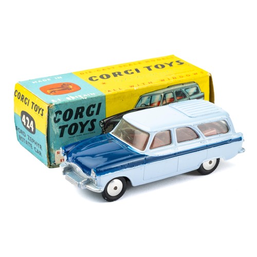 128 - Corgi 424 Ford Zephyr Estate in two-tone blue, about excellent in fair to good box.