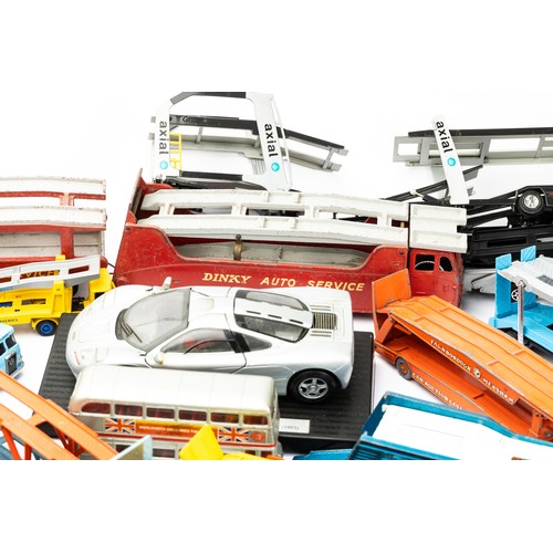 103 - Diecast collection of unboxed car transporters, lorries, cars etc, with ranges by Dinky, Matchbox an... 