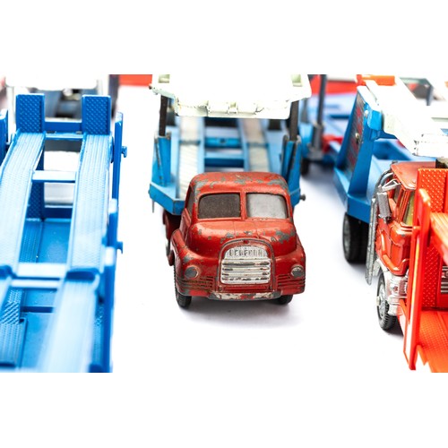 107 - Corgi car transporter collection with 14 unboxed transporters along with 3 accompanying empty boxes,... 