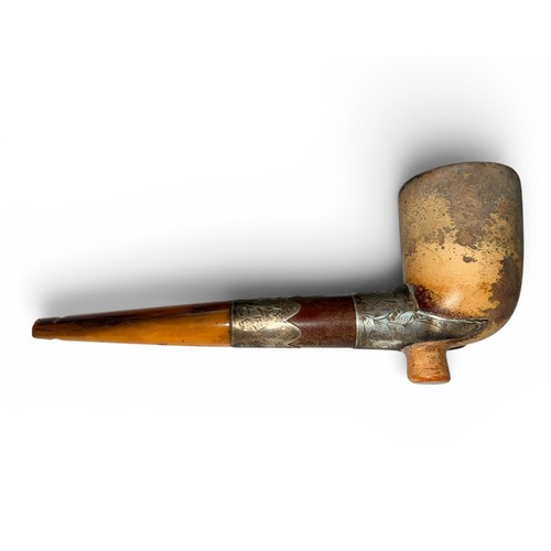 657 - A Victorian Meerschaum Pipe, with silver holders hallmarked 'KB' and an amberlite stem. In a fitted ... 