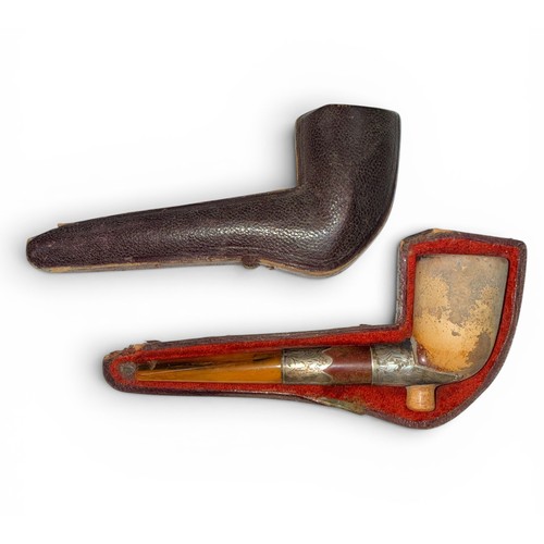 657 - A Victorian Meerschaum Pipe, with silver holders hallmarked 'KB' and an amberlite stem. In a fitted ... 