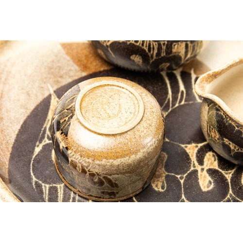 625 - Diane Worthy for Critch Pottery - a teapot, cream jug and sugar bowl with circular tray.  Impressed ... 