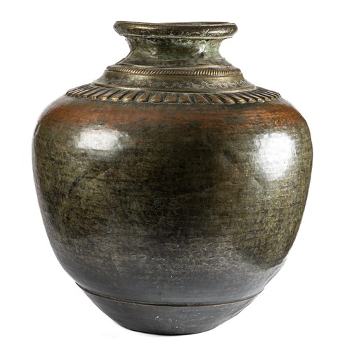 705 - A large South Indian copper water pot / planter. Foliate surround to upper with hammered patina. Hei... 