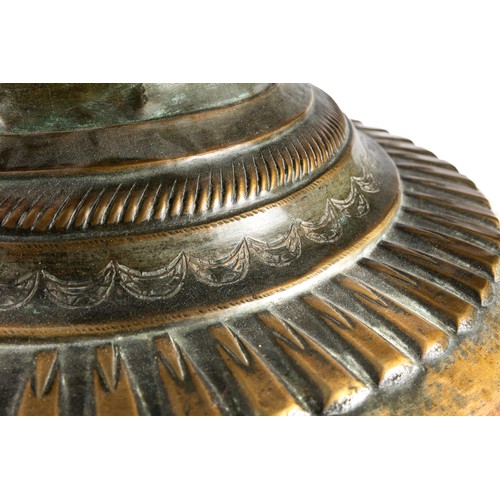 705 - A large South Indian copper water pot / planter. Foliate surround to upper with hammered patina. Hei... 