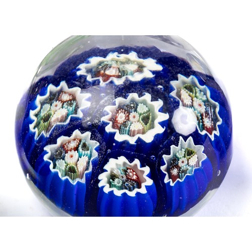 641 - Paperweights, a range of seven glass paperweights. Includes; Langham Mooncrystal etc. (7)