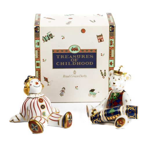 529 - Royal Crown Derby, a pair of Royal Crown Derby Treasures of Childhood paperweights. Includes; Clown ... 