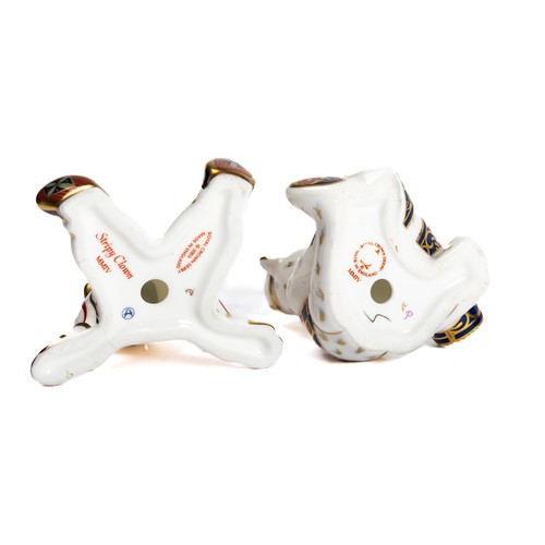 529 - Royal Crown Derby, a pair of Royal Crown Derby Treasures of Childhood paperweights. Includes; Clown ... 