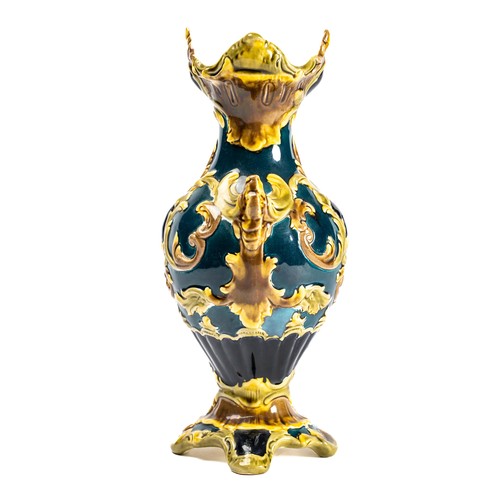 551 - Julius Dressler 19th Century Art Nouveau pottery vase with scrolling pattern and green ground. Stamp... 