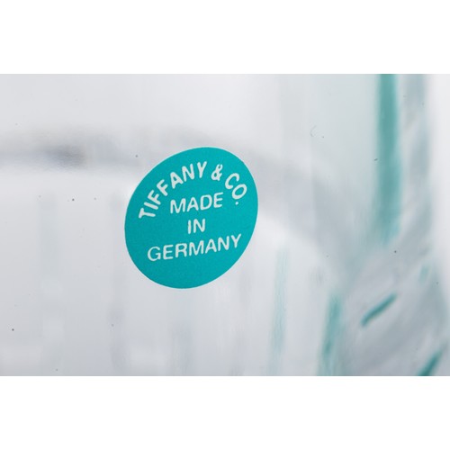 633 - Tiffany & Co, a pair of boxed Tiffany & Co glassware items. Includes; Tiffany & Co Aurora World Crui... 