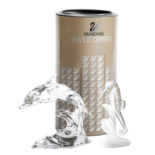 631 - Swarovski, a Swarovski glass seahorse (boxed) and Swarovski glass dolphin. (2)