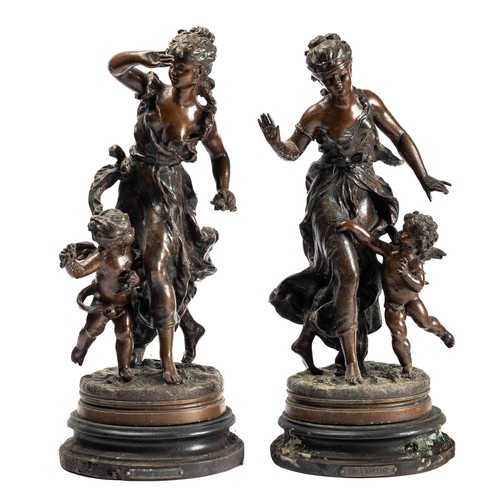 648 - Hippolyte Moreau (French, 1832-1926), pair of spelter 20th Century bronzed spelter dancing lady with... 