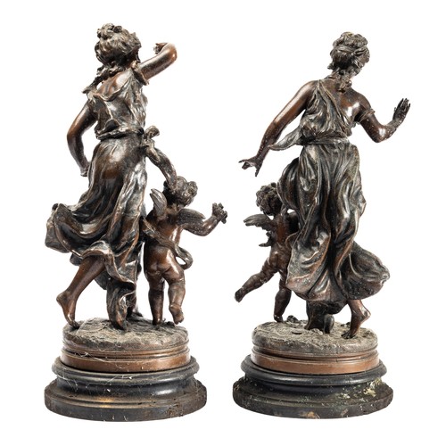 648 - Hippolyte Moreau (French, 1832-1926), pair of spelter 20th Century bronzed spelter dancing lady with... 