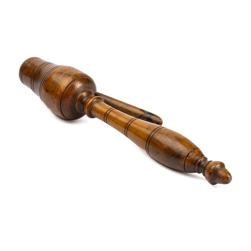 651 - A 19th century treen boxwood teacher's clicker, clicket or snapper, having turned acorn tip, 22cm lo... 
