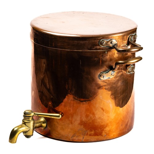 673 - A 19th century copper vessel, the boiler and cover fitted two handles each, having a brass tap, 33cm... 