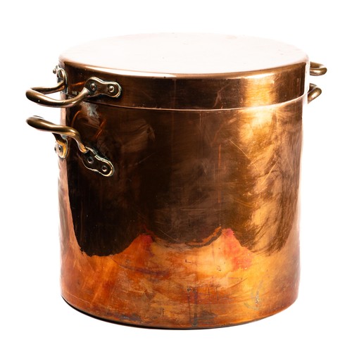 673 - A 19th century copper vessel, the boiler and cover fitted two handles each, having a brass tap, 33cm... 