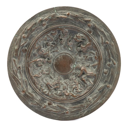 649 - A late 19th century cast bronze tazza, decorated with Poseidon and cavorting figures, within a bullr... 