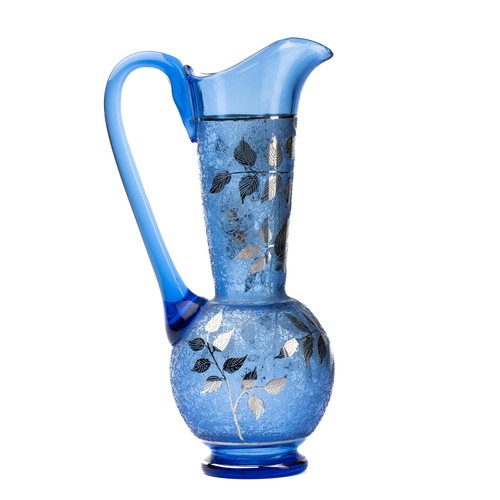 632 - Cobalt blue glass jug with silvered floral decoration and handpainted coloured flower. Unsigned, wit... 