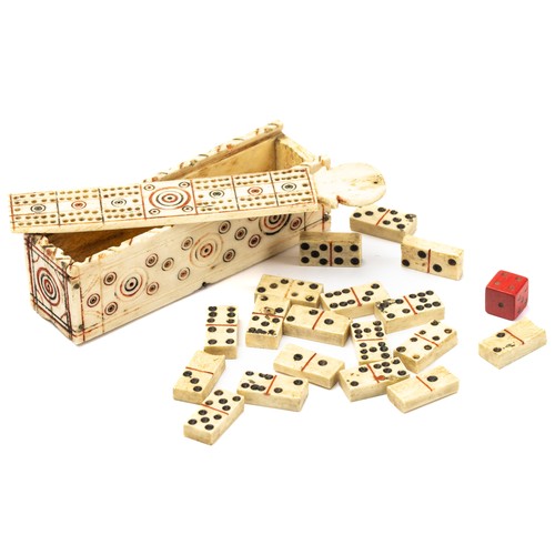 654 - An early 19th century, Napoleonic prisoner of war, bone  domino box, carved circle decoration, red a... 