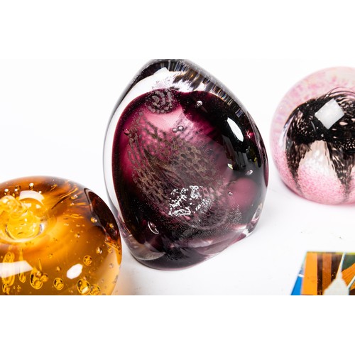 642 - A collection of nine glass paperweights, includes a Caaithness titled 