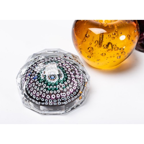 642 - A collection of nine glass paperweights, includes a Caaithness titled 